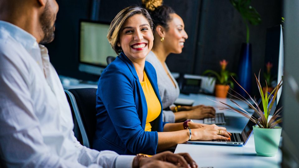 Woman working with her team